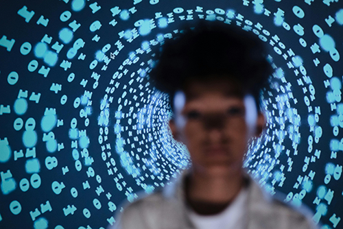 Girl with digital code in the background