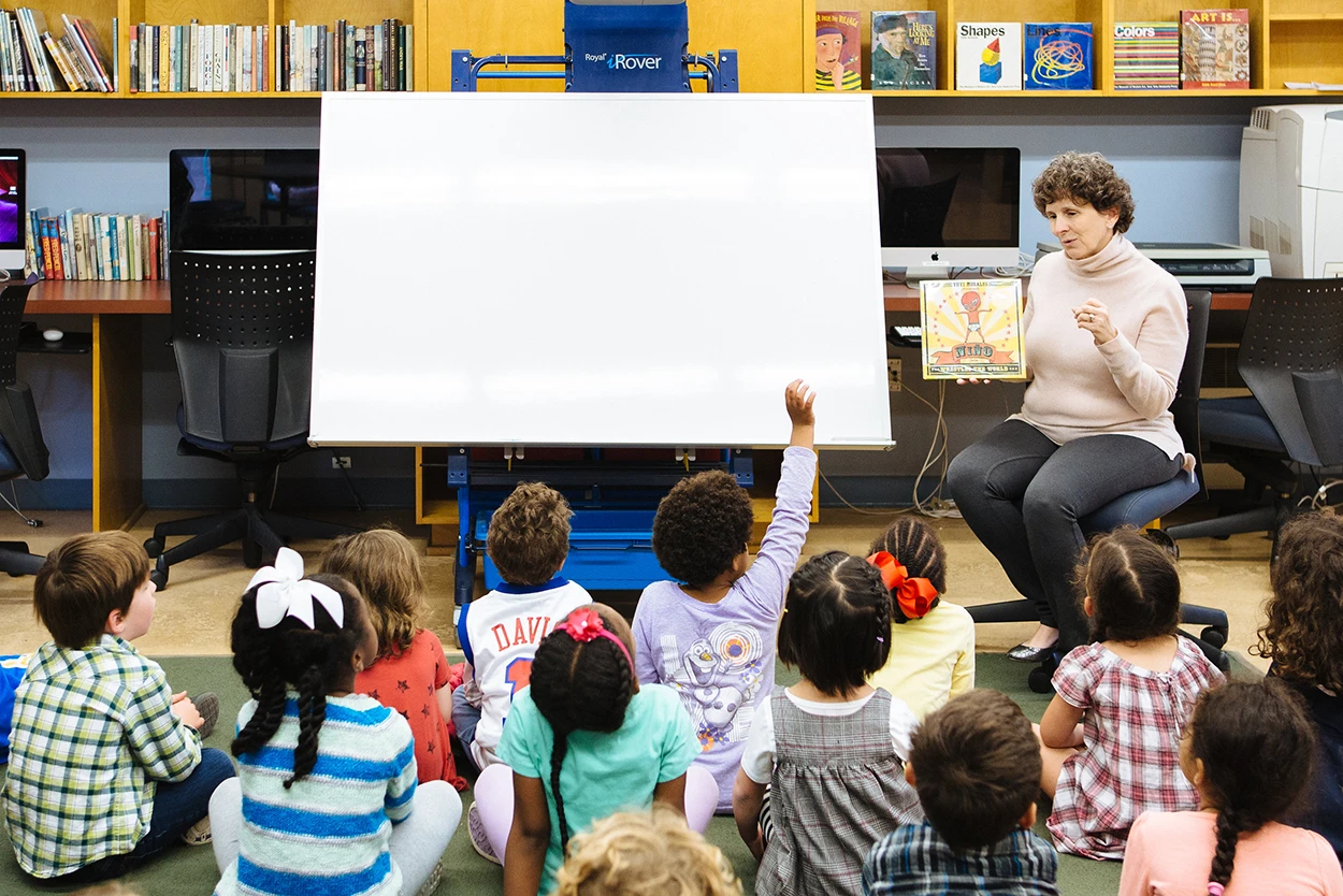 Teacher reading to students